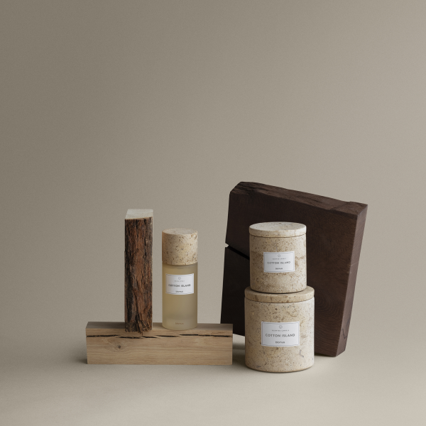 Elegant skincare products displayed on natural wooden elements against a neutral background.