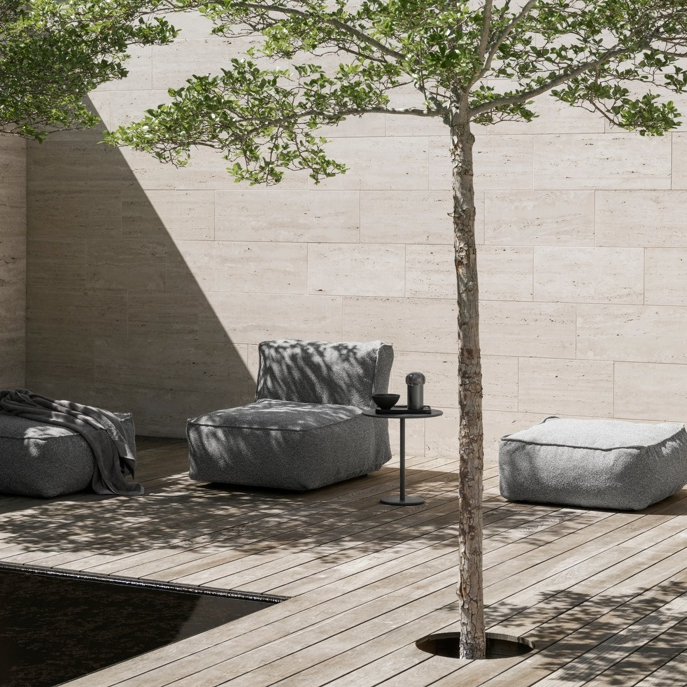 outdoor sitzcouch grow in grau stehend auf einer terrasse